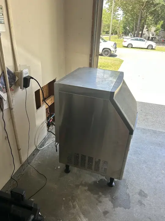 Commercial ice machine connected to a new water line